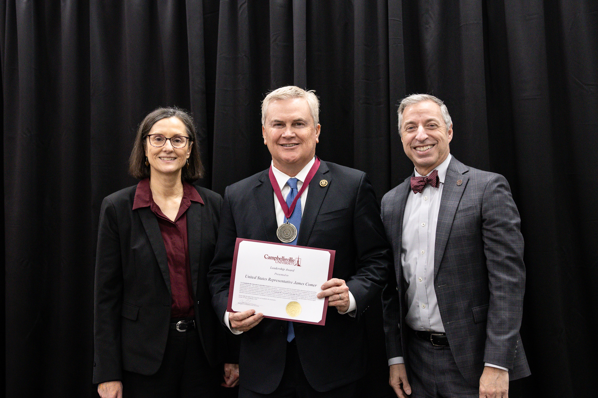 Vice President of Academic Affairs Jeanette Parker (left) and CU President Dr. Joseph Hopkins (right) present the servant leadership award to Congressman James Comer (middle)