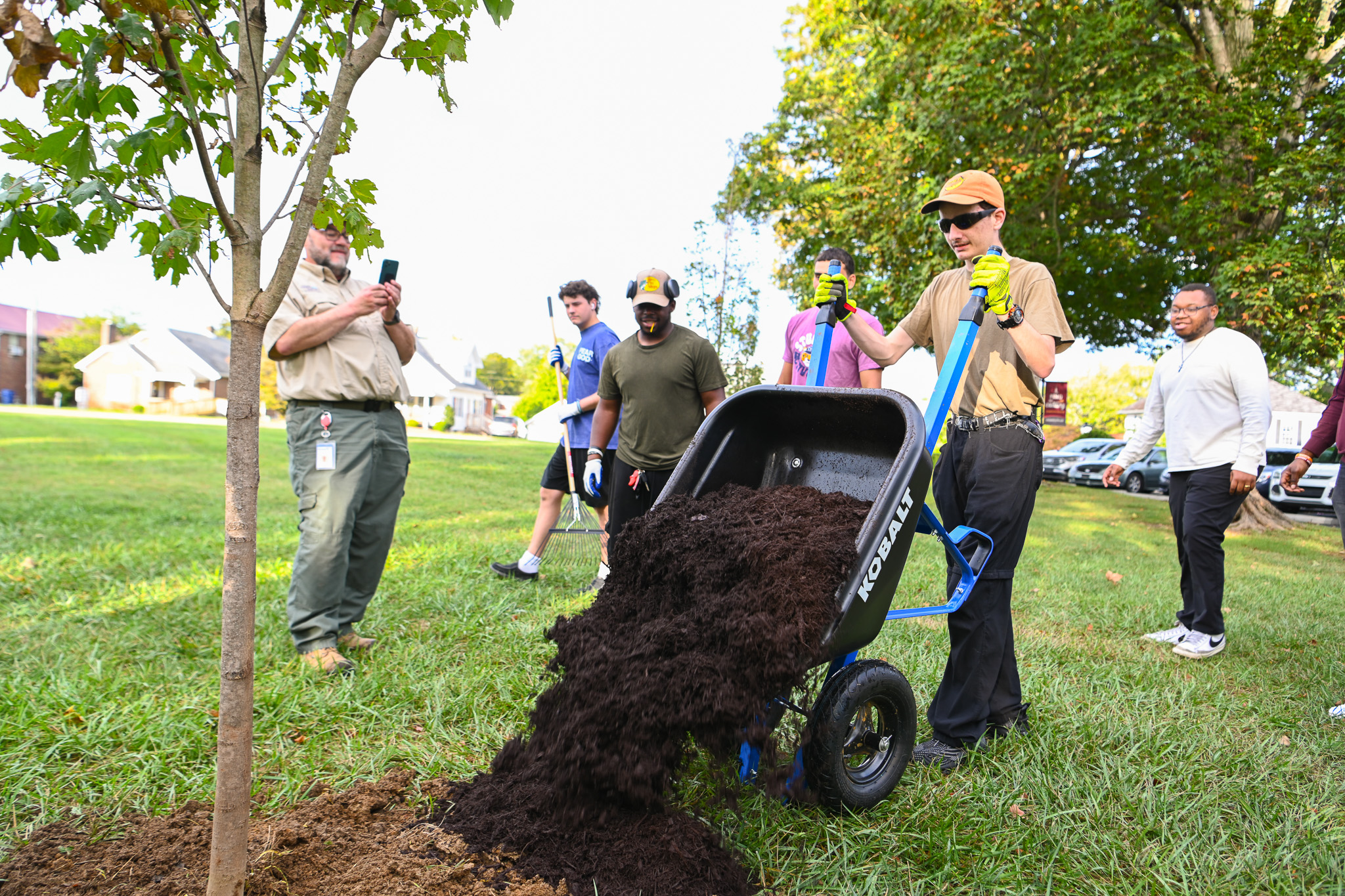 CU students plant new trees for the maple trail restoration project
